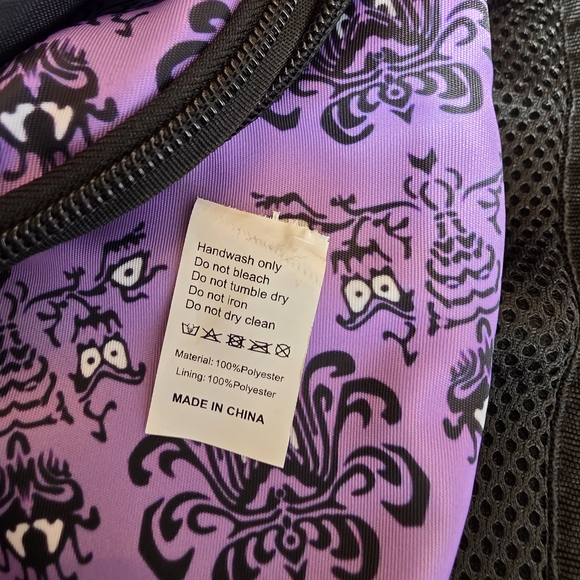 Haunted Mansion-themed sling backpack is a purple crossbody bag - Picture 6 of 8